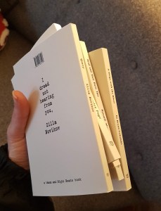 all the books, seen from behind