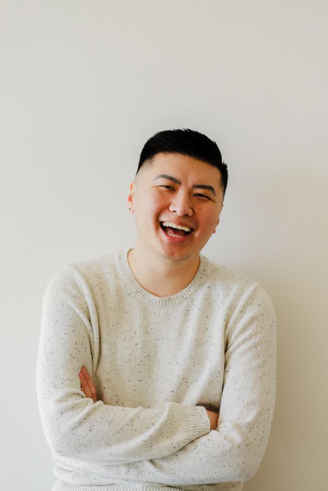 David Ly smiling at the camera